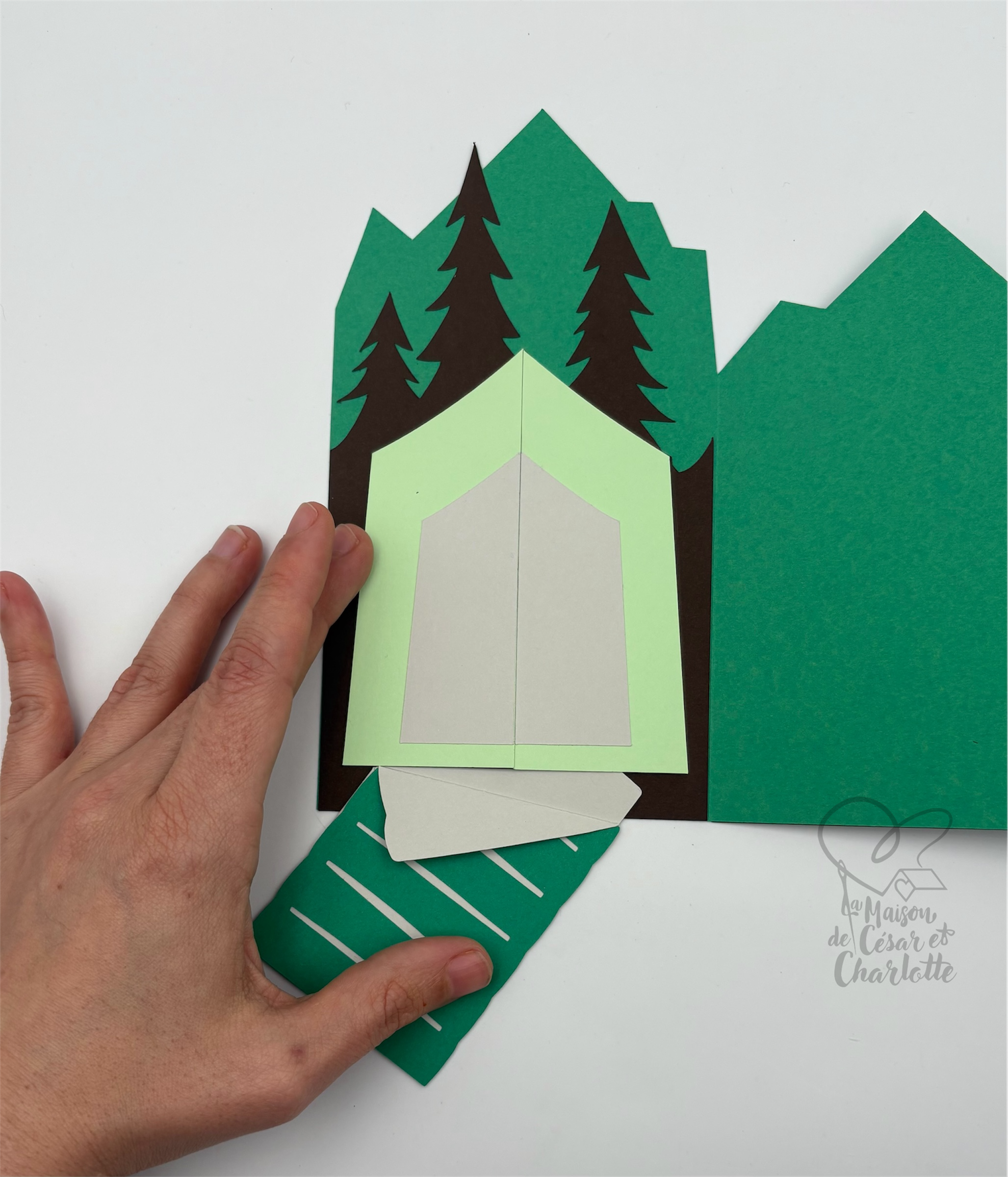 Carte montagne avec sac de couchage