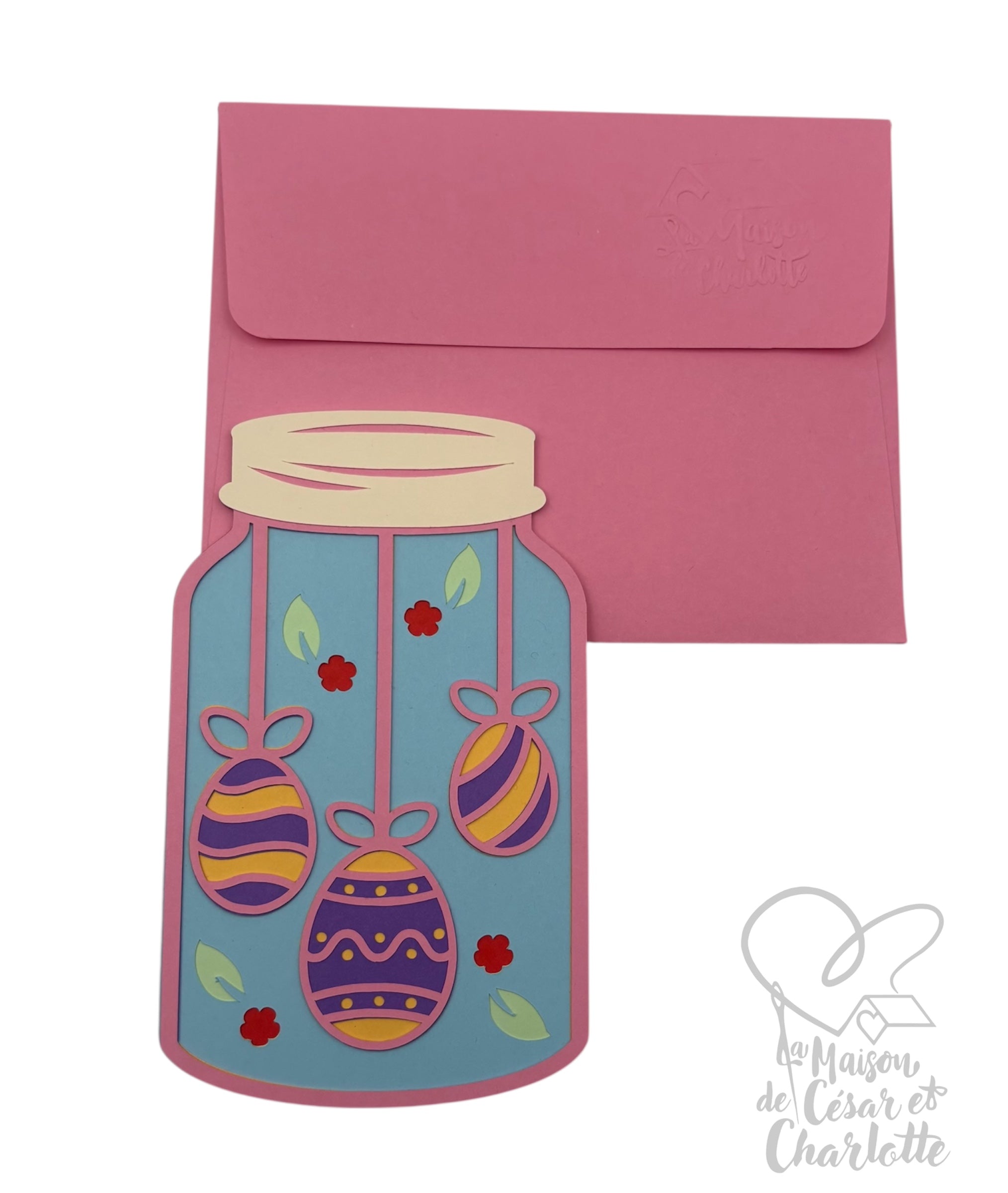 Carte de Pâques en bocal,artisanale originale en forme de bocal, décorée de jolis œufs suspendus aux motifs colorés.